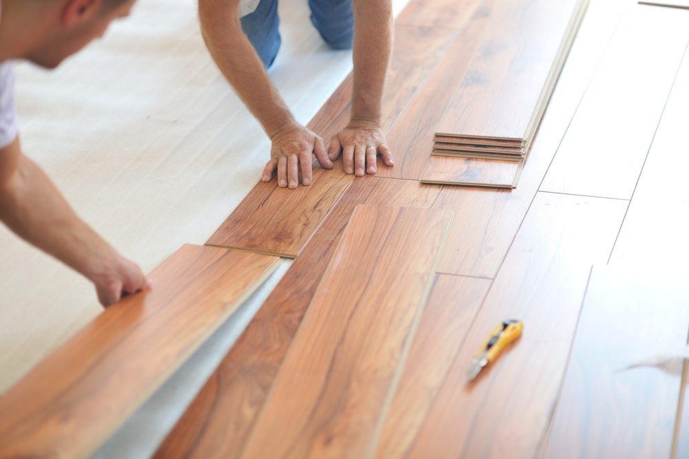 Installing laminate flooring in new custom home indoor